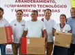 Reciben escuelas de Tututepec equipamiento tecnológico y material cívico
